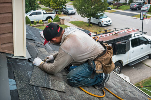 Professional Gutter Installation technician working in Wakefield, MI